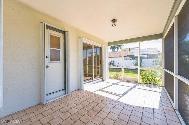 view of unfurnished sunroom