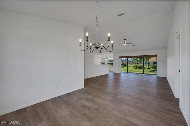 unfurnished dining area featuring wood-type flooring, ceiling fan with notable chandelier, and high vaulted ceiling