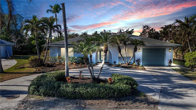 view of front of home with a garage