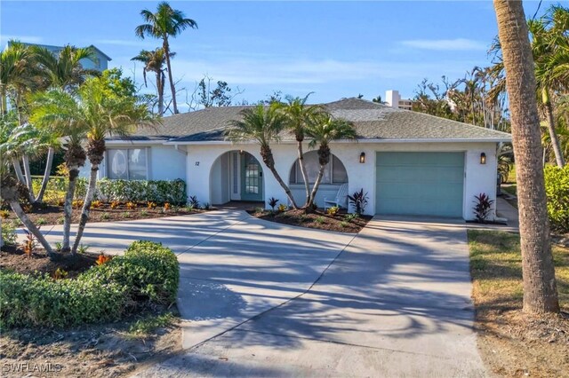 ranch-style home with a garage