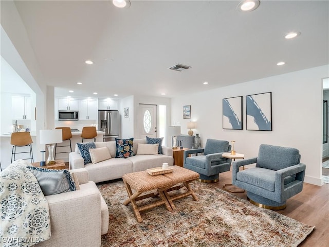 living room featuring light hardwood / wood-style flooring