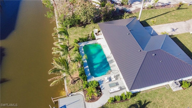 drone / aerial view with a water view