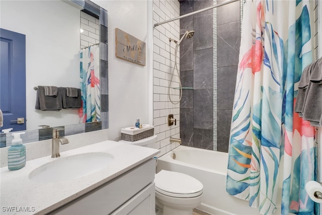 full bathroom featuring shower / tub combo with curtain, vanity, and toilet