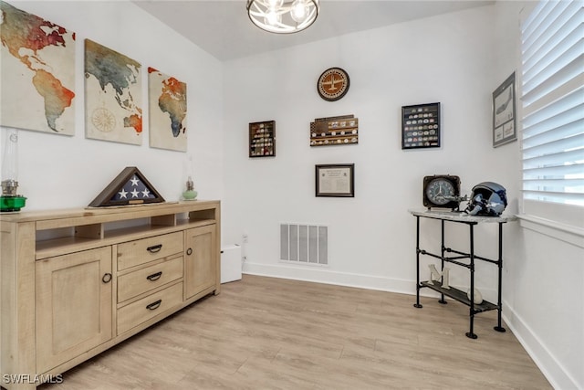 interior space featuring light brown cabinetry and light hardwood / wood-style floors