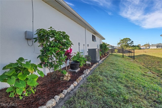 view of yard featuring central AC