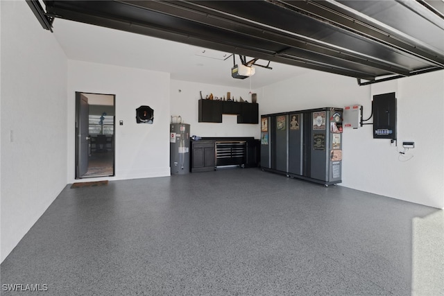 garage featuring electric panel, a garage door opener, and water heater