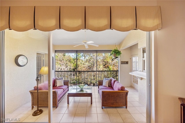 sunroom featuring ceiling fan