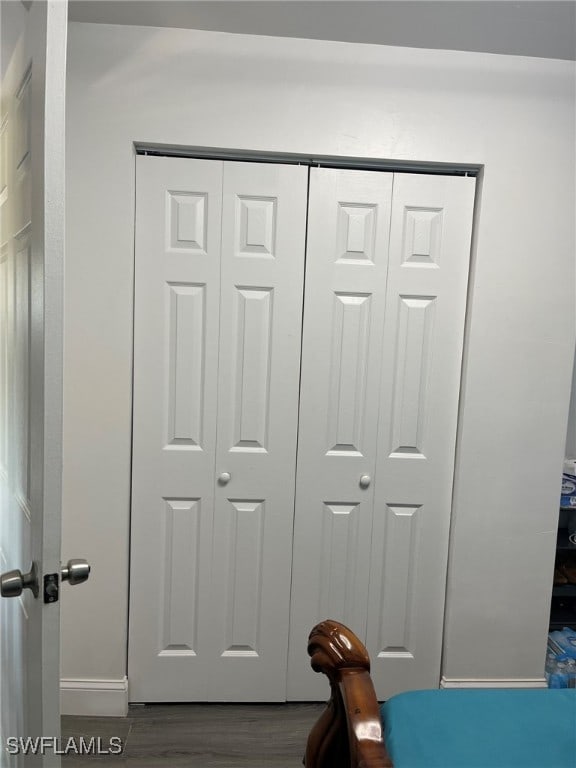 interior details featuring hardwood / wood-style flooring