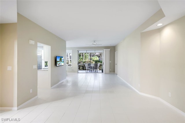 hall with light tile patterned flooring