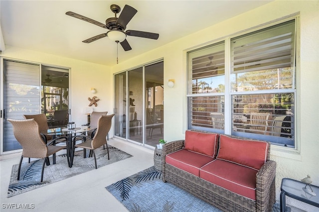 view of patio featuring outdoor lounge area and ceiling fan