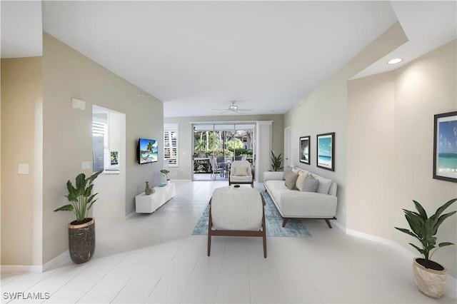 living room featuring ceiling fan