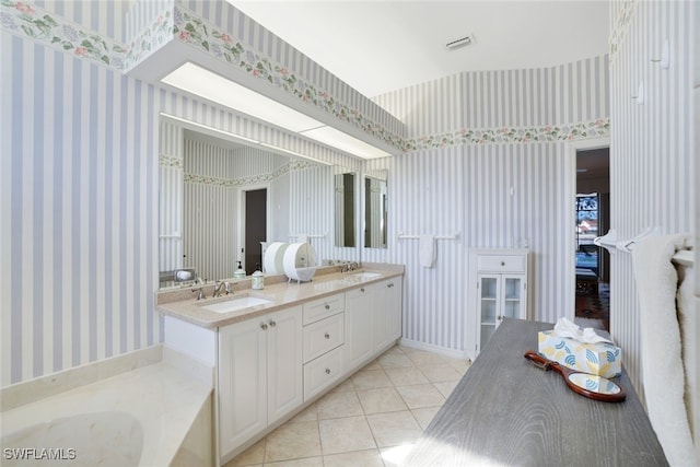 bathroom with vanity and tile patterned floors