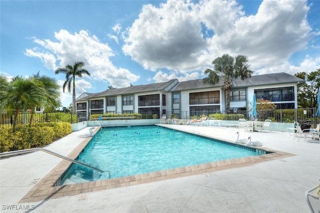 view of swimming pool featuring a patio