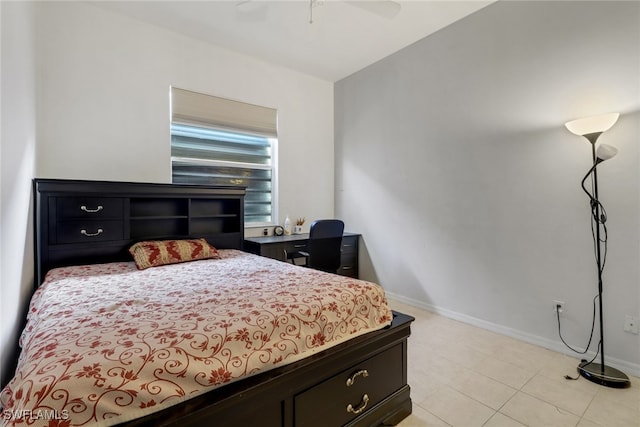 bedroom featuring ceiling fan and light tile patterned floors