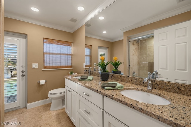 bathroom with vanity, crown molding, tile patterned flooring, toilet, and a shower with shower door