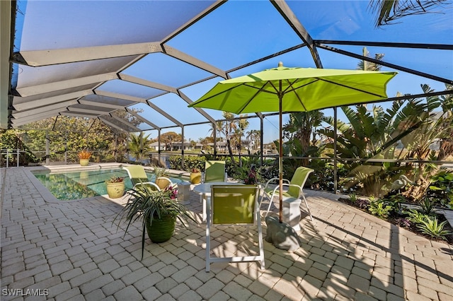 view of patio with a lanai