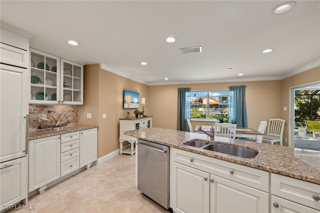 kitchen with white cabinetry, a wealth of natural light, and dishwasher