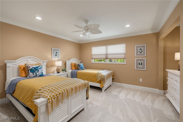 carpeted bedroom featuring ceiling fan and crown molding