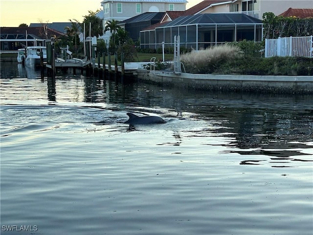 view of dock with a water view