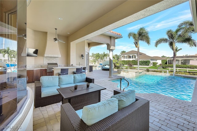 view of pool with an in ground hot tub, an outdoor hangout area, area for grilling, a patio area, and a grill