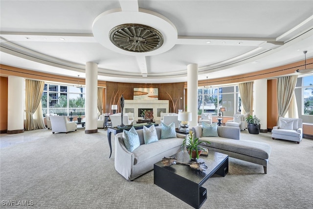 carpeted living room featuring a healthy amount of sunlight