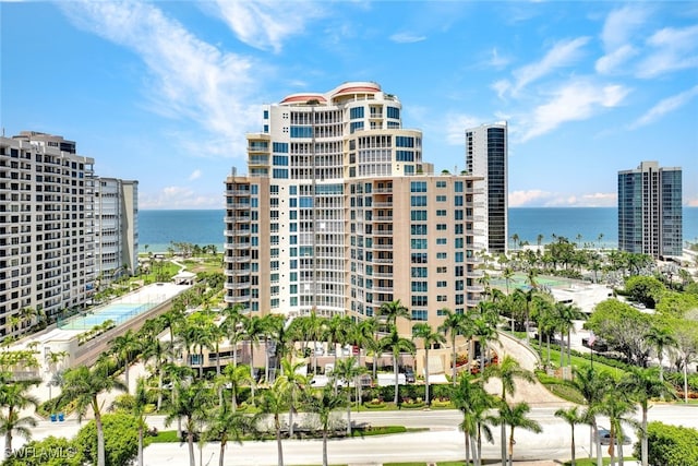 view of building exterior featuring a water view