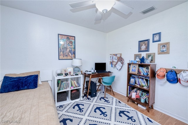 interior space featuring hardwood / wood-style flooring and ceiling fan