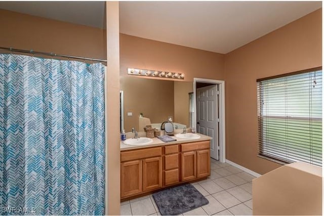 bathroom featuring tile patterned floors and vanity