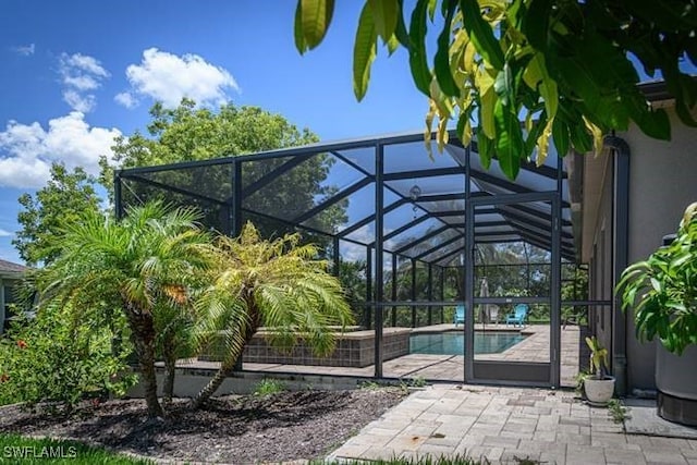 exterior space with a patio area and a lanai