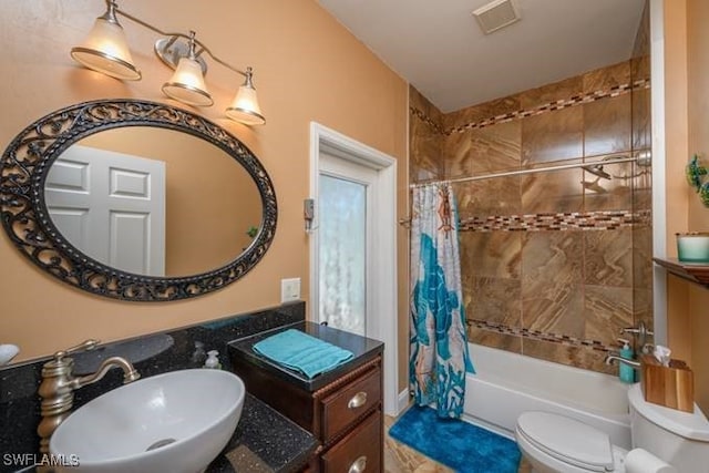 full bathroom with toilet, sink, and shower / tub combo