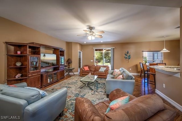 living room featuring ceiling fan