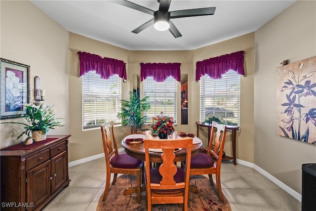 dining area featuring plenty of natural light, ceiling fan, and light tile patterned flooring