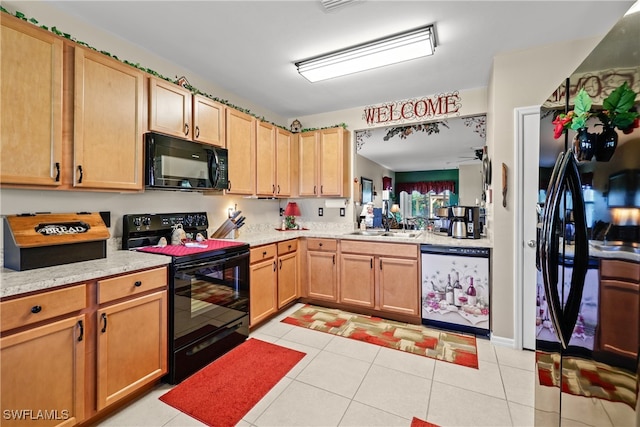 kitchen with ceiling fan, sink, light tile patterned floors, and black appliances