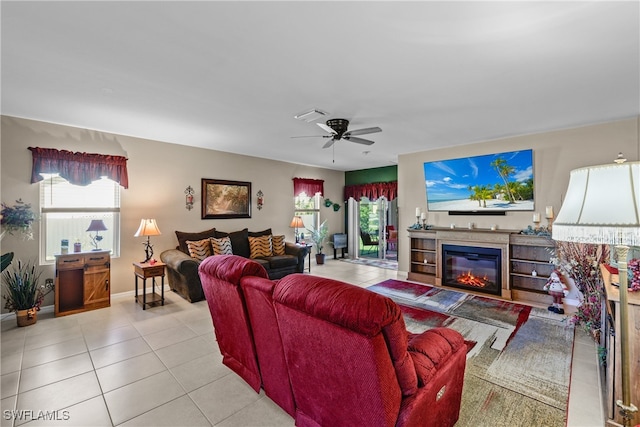 tiled living room with ceiling fan