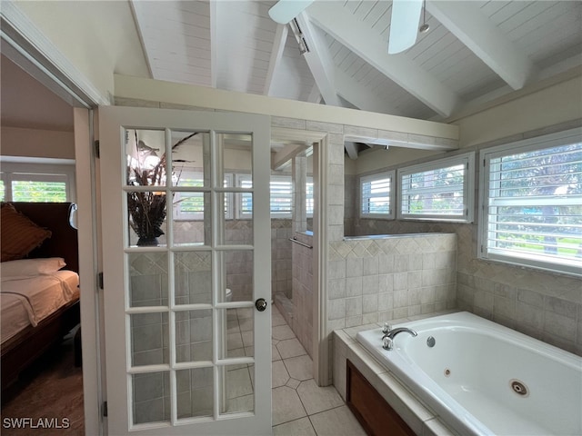 bathroom with a bathing tub, vaulted ceiling with beams, wood ceiling, and tile patterned flooring