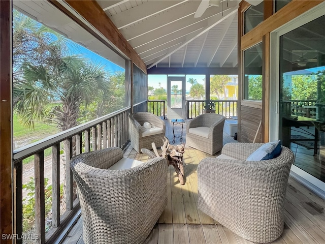 sunroom / solarium with lofted ceiling