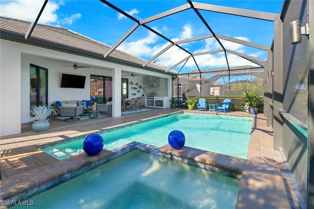 view of swimming pool featuring glass enclosure, an in ground hot tub, a patio area, outdoor lounge area, and ceiling fan