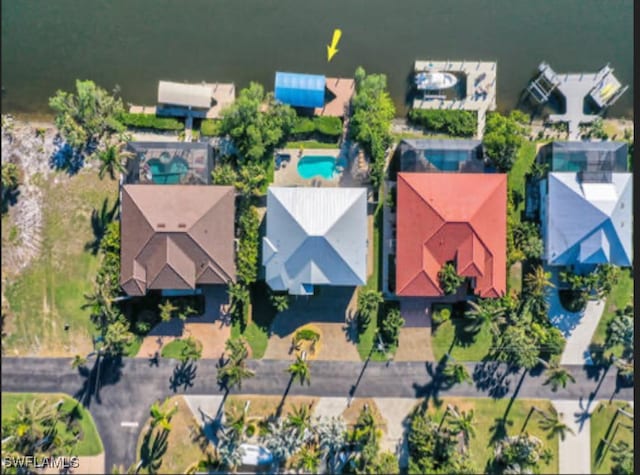 drone / aerial view with a water view