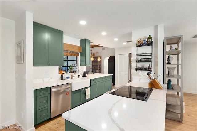 kitchen featuring dishwasher, black electric stovetop, light stone countertops, and green cabinetry