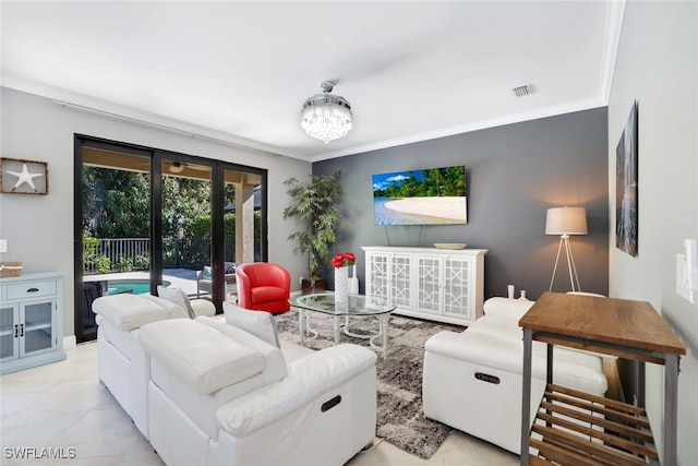 living room featuring french doors, a chandelier, light tile patterned floors, and ornamental molding