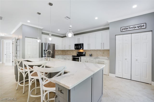 1350 Triandra Ln, Naples, FL 34119 - kitchen featuring stainless steel appliances, ornamental molding, backsplash, white cabinets, and light stone counters
