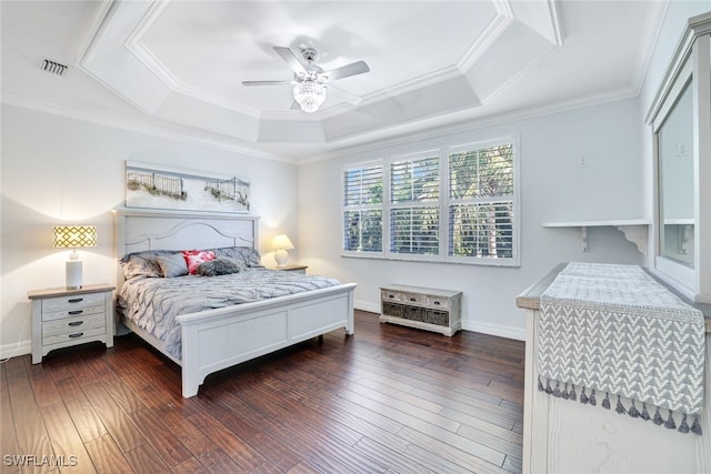 bedroom featuring ceiling fan, dark hardwood / wood-style flooring, ornamental molding, and a raised ceiling