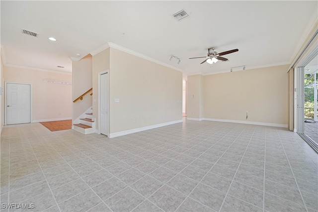 unfurnished room featuring stairs, visible vents, and ornamental molding