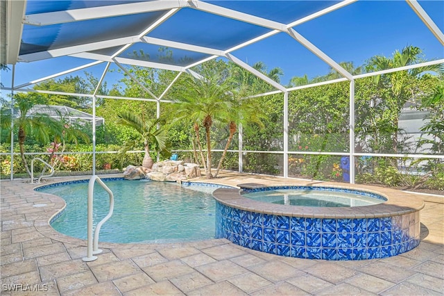 view of swimming pool with glass enclosure, a patio, and a pool with connected hot tub