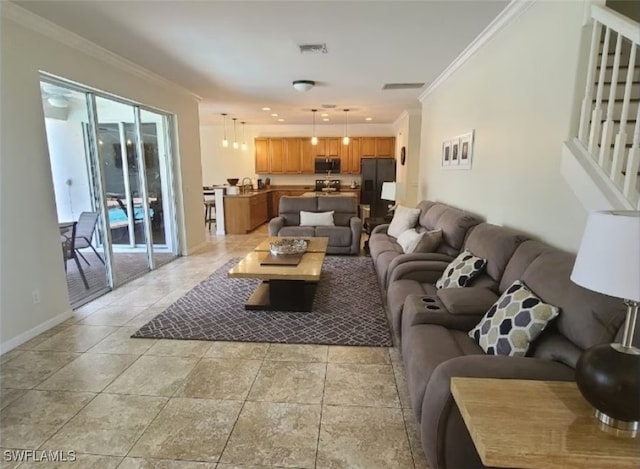 living room featuring crown molding