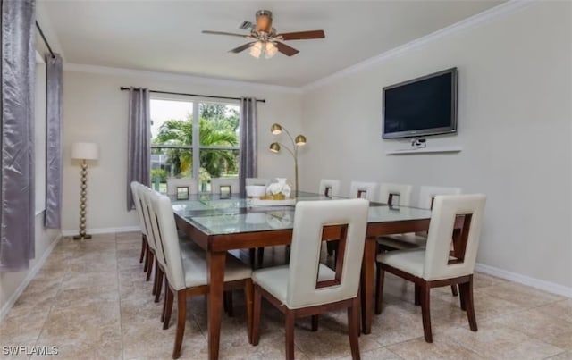 dining room with ceiling fan, light tile patterned floors, and crown molding