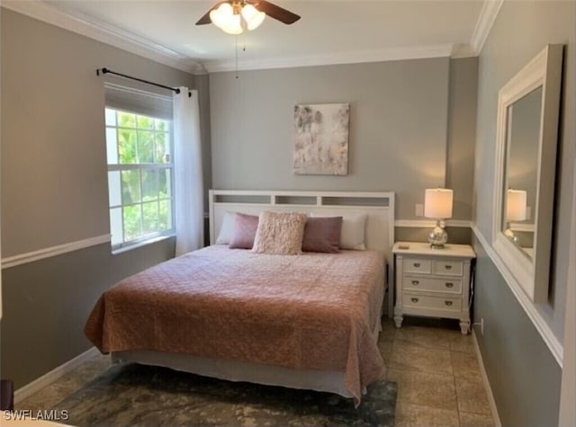 tiled bedroom featuring ceiling fan and crown molding