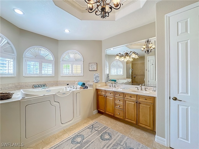 bathroom with tile patterned floors, vanity, crown molding, a shower, and washing machine and dryer