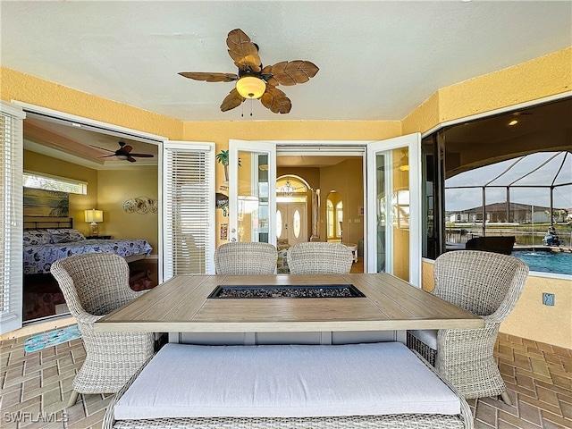 dining room featuring ceiling fan