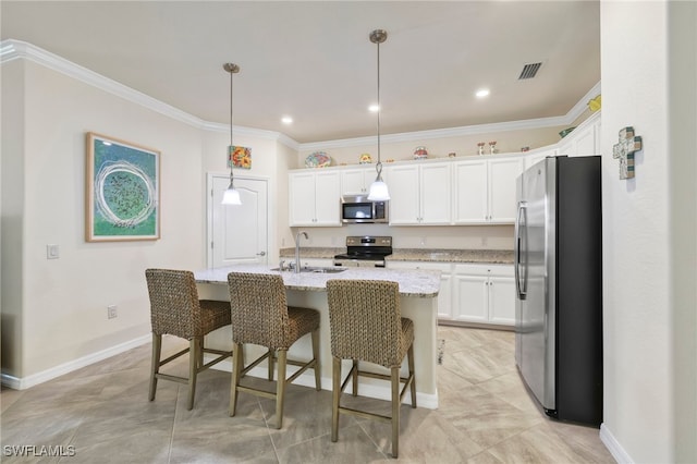 kitchen with sink, decorative light fixtures, white cabinetry, a kitchen island with sink, and appliances with stainless steel finishes